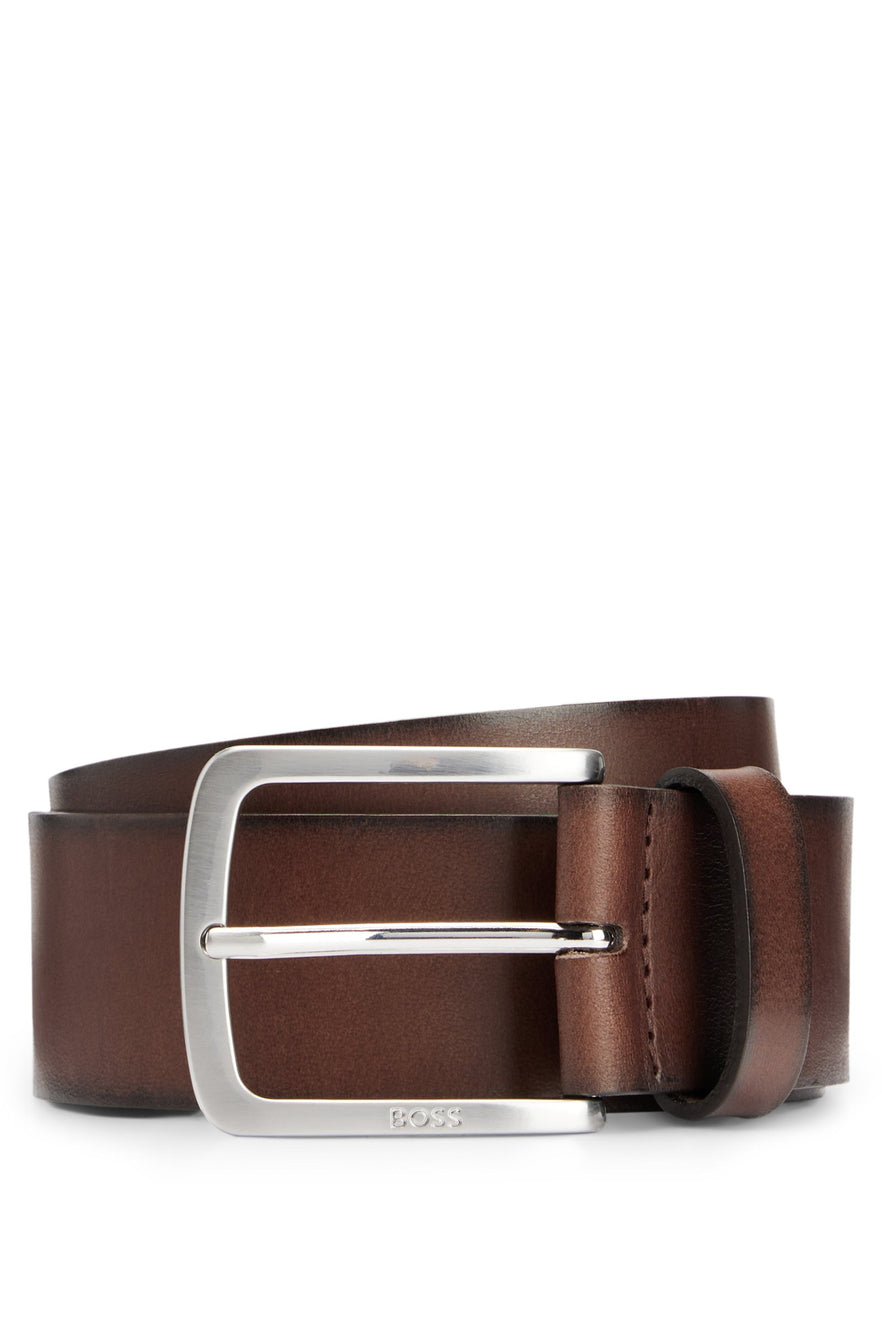 A 4cm belt crafted in vegetable-tanned Italian leather with a logo-engraved pin buckle by BOSS. For the best fit, we advise ordering a belt one size larger than your waist size.