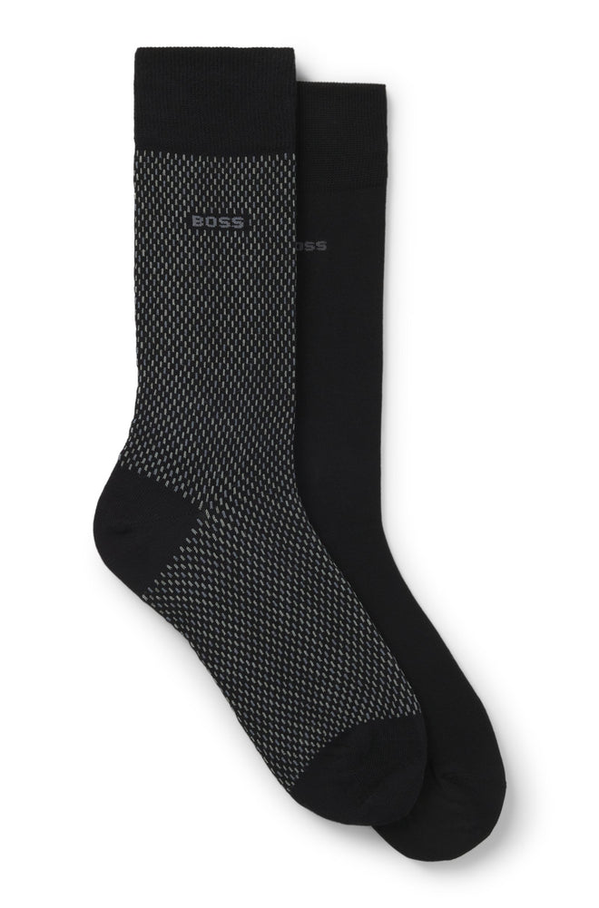 A duo of patterned and plain socks by BOSS. Featuring a logo detail, each regular-length pair is crafted in a stretch blend with cotton.
